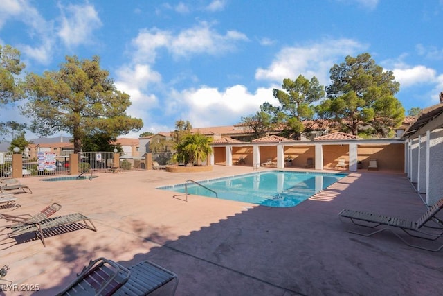 view of pool featuring a patio