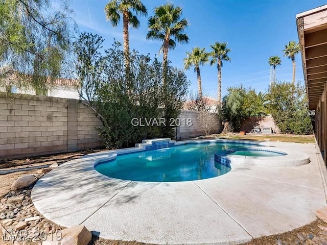 view of swimming pool featuring a patio area