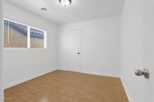 unfurnished room featuring light wood-type flooring