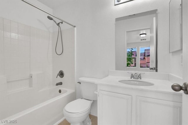 full bathroom featuring vanity, toilet, and shower / bath combination