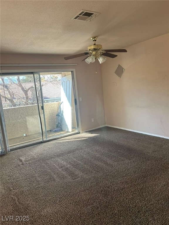 unfurnished room featuring carpet flooring and ceiling fan