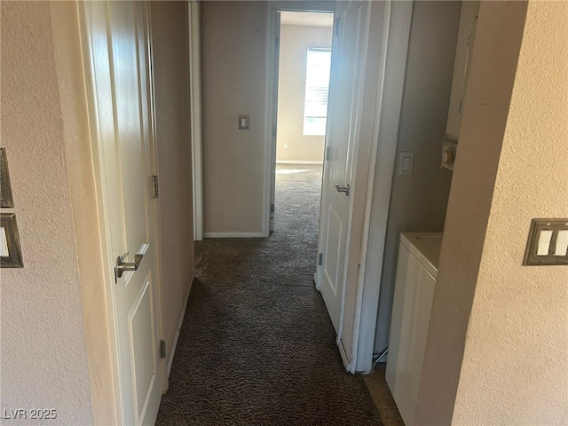 corridor with dark carpet