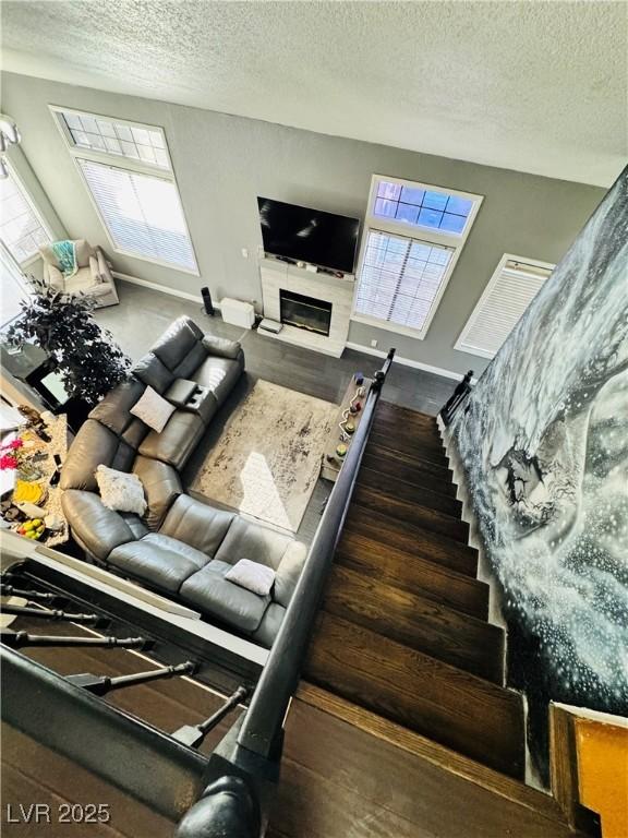 living room featuring a textured ceiling