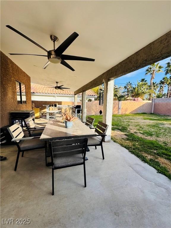 view of patio with ceiling fan