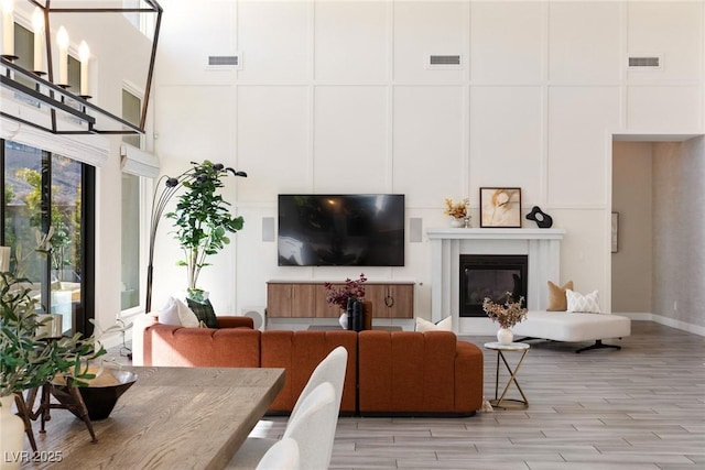 living room with light hardwood / wood-style floors