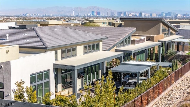 rear view of house with a mountain view