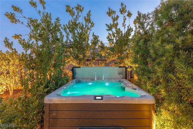 view of pool featuring a hot tub