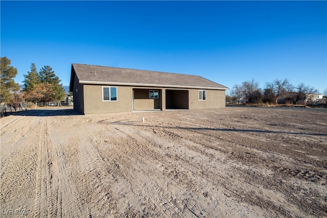 exterior space with stucco siding