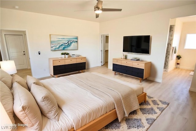 5821 Genoa Ave, Pahrump, NV 89060 - bedroom featuring light wood-style flooring, baseboards, and ceiling fan
