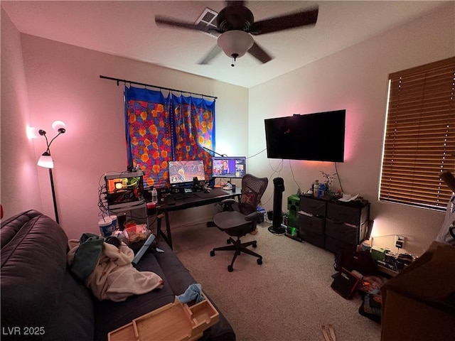 home office with carpet flooring and ceiling fan