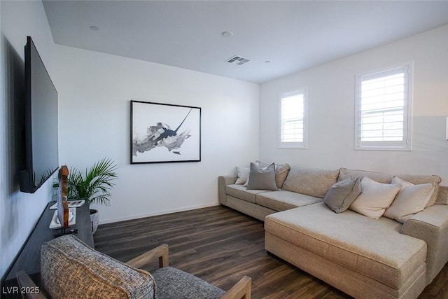 living room featuring dark hardwood / wood-style floors