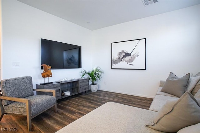 living room featuring dark wood-type flooring