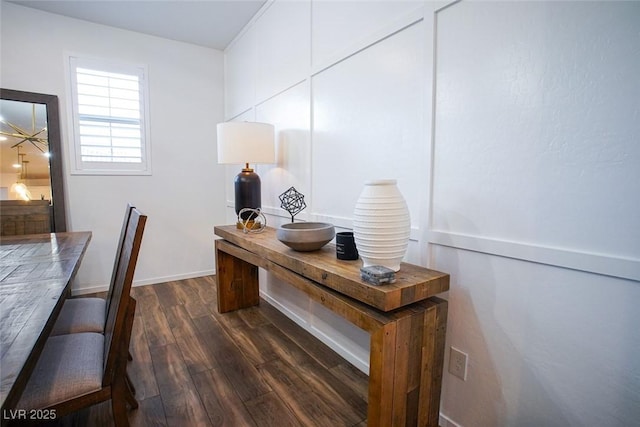 office with dark hardwood / wood-style floors