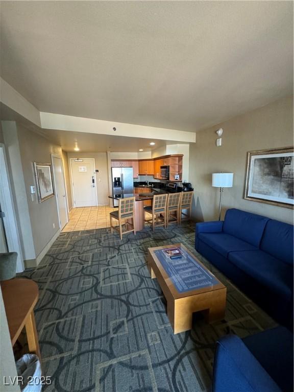 living room featuring light colored carpet