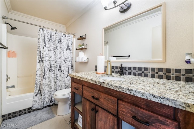 full bathroom featuring crown molding, vanity, tile patterned floors, toilet, and shower / bath combo with shower curtain