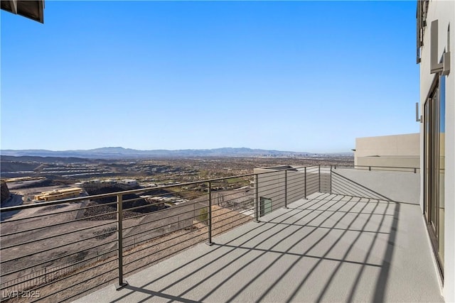 balcony featuring a mountain view