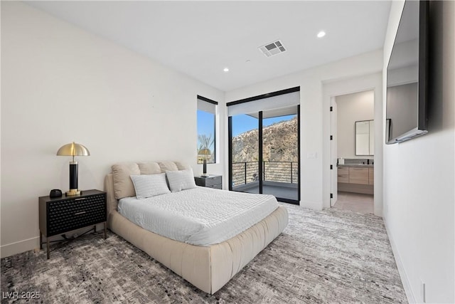 bedroom with access to exterior, baseboards, and visible vents