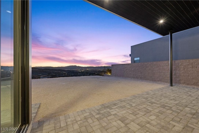 patio terrace at dusk with fence