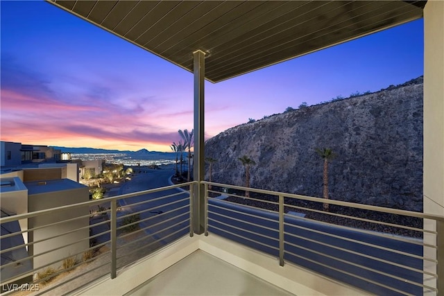 balcony featuring a mountain view