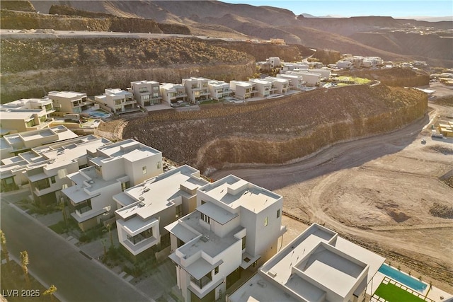 bird's eye view with a residential view and a mountain view