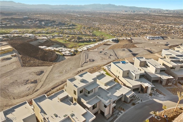 bird's eye view with a residential view and a mountain view