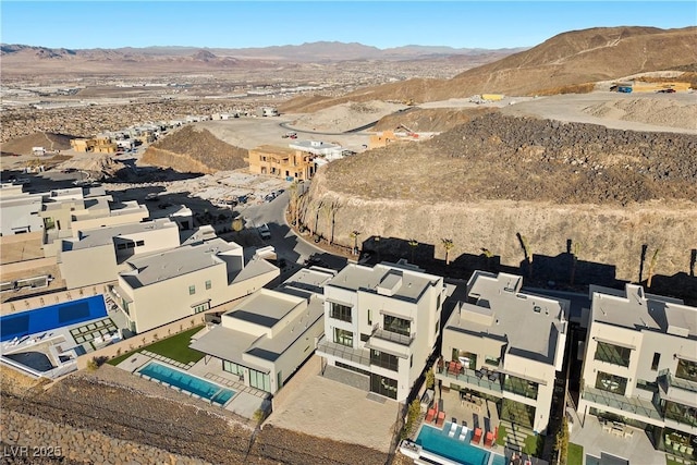 bird's eye view featuring a residential view and a mountain view