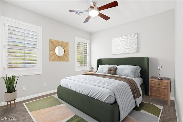 carpeted bedroom with ceiling fan