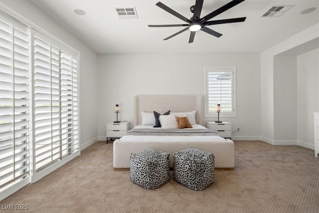 carpeted bedroom featuring ceiling fan