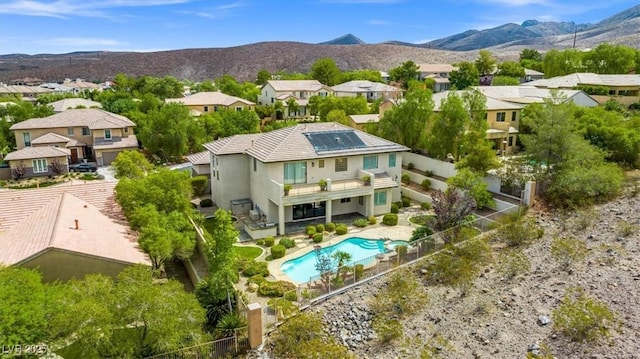 drone / aerial view featuring a mountain view