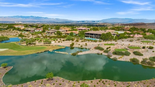 bird's eye view featuring a water and mountain view