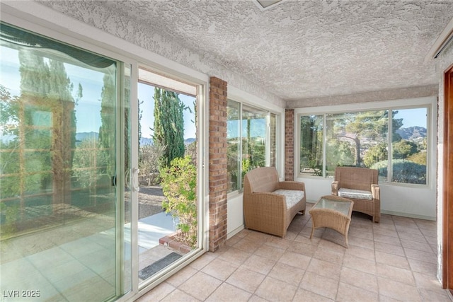 sunroom / solarium featuring a wealth of natural light