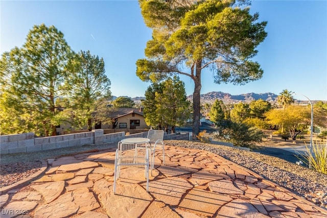 view of patio featuring a mountain view