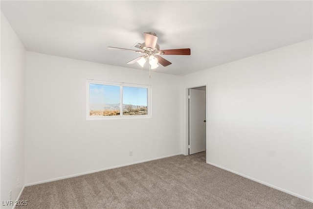 empty room with light carpet and ceiling fan