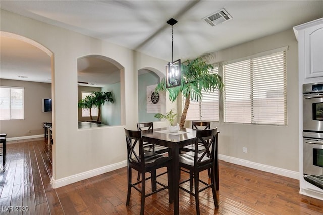 dining room featuring dark hardwood / wood-style floors