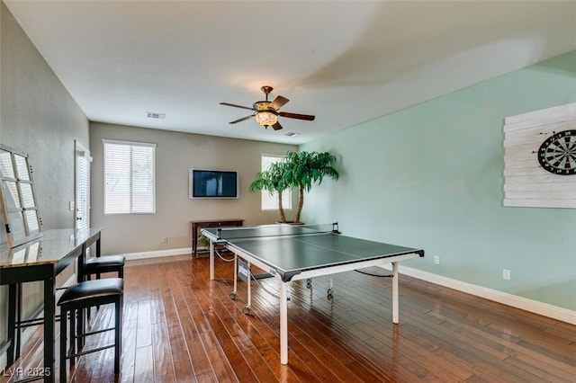 recreation room featuring dark wood-type flooring and ceiling fan