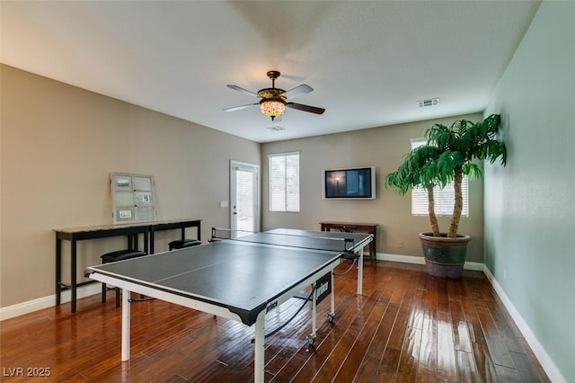 playroom with dark hardwood / wood-style floors and ceiling fan