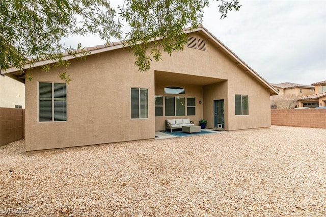 rear view of house featuring an outdoor hangout area and a patio area