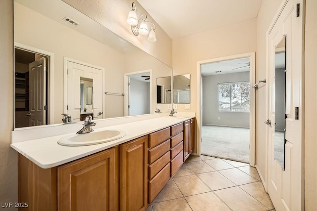 bathroom with vanity and tile patterned floors