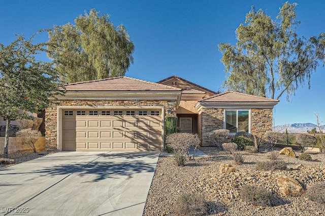 ranch-style home with a garage and a mountain view