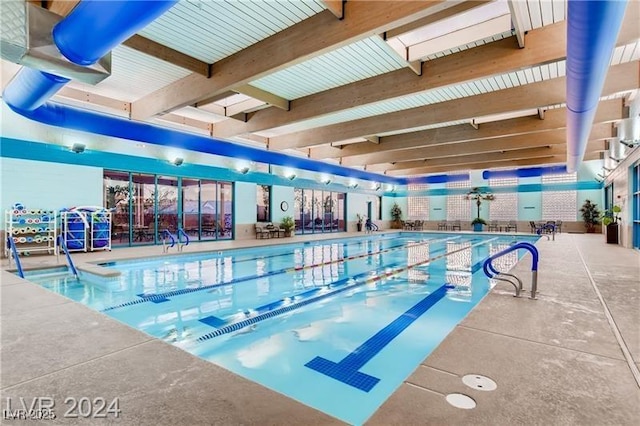 view of pool featuring a water slide