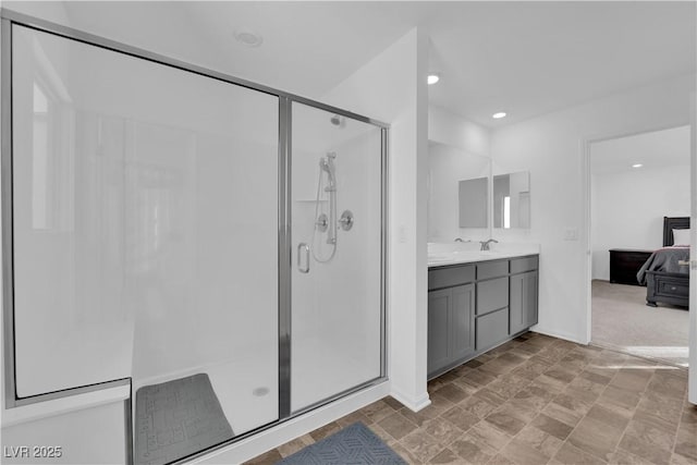 bathroom with vanity and walk in shower