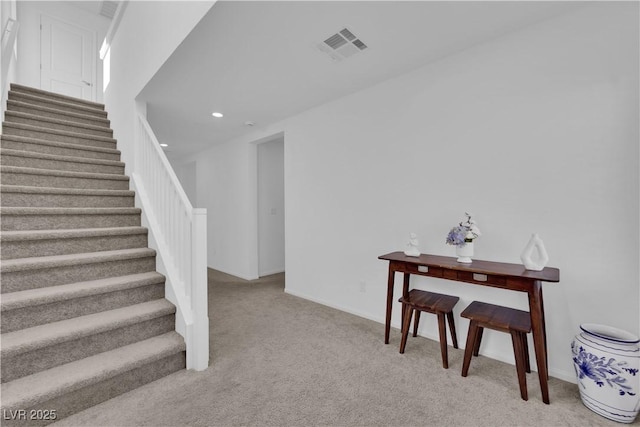 stairs with carpet floors