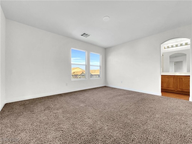 view of carpeted spare room