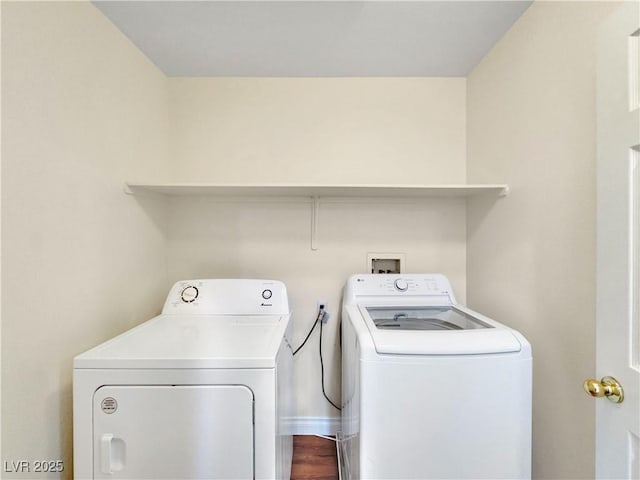 laundry room with washer and clothes dryer