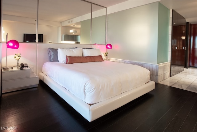 4381 W Flamingo Rd Unit 2903, Las Vegas, NV 89103 - bedroom with hardwood / wood-style floors