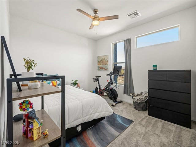 bedroom with ceiling fan and carpet flooring