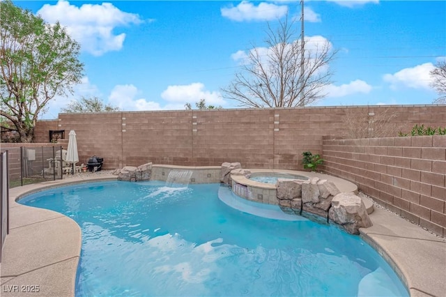 view of swimming pool with an in ground hot tub and pool water feature