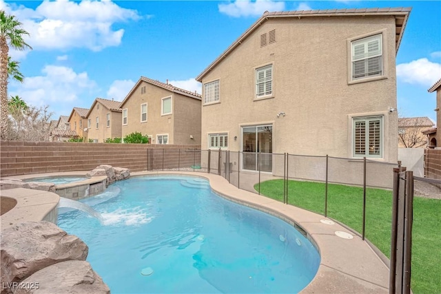 view of swimming pool with an in ground hot tub and pool water feature