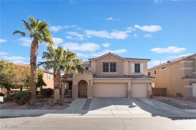 mediterranean / spanish-style house featuring a garage