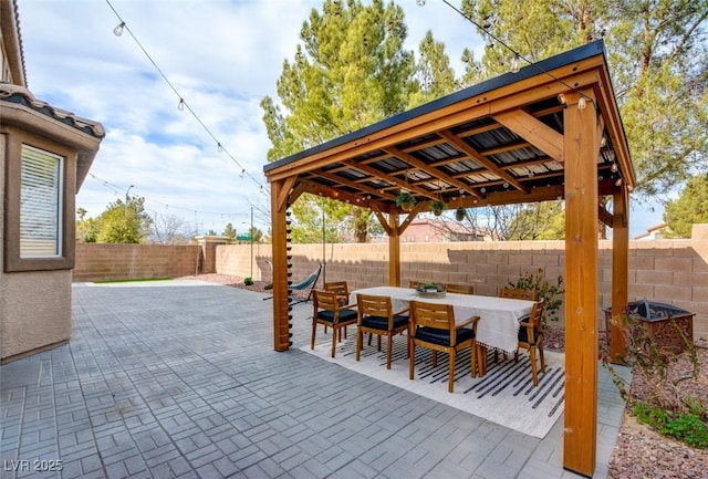 view of patio / terrace with a fenced backyard and outdoor dining area